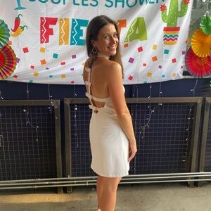 BHLDN White backless mini bow dress